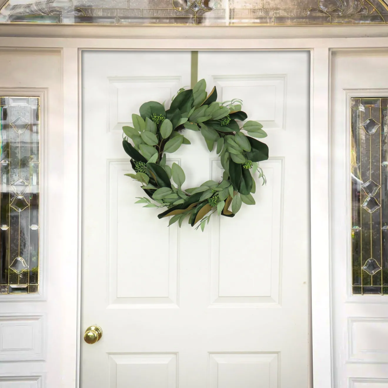 Clearance 22 in. Spring Wreath with Eucalyptus Leaves, Magnolia Blooms, Flowing Green Stems Wreaths